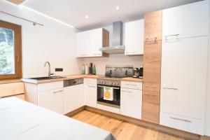 Kuchyň nebo kuchyňský kout v ubytování Ferienhaus Leite Häusl