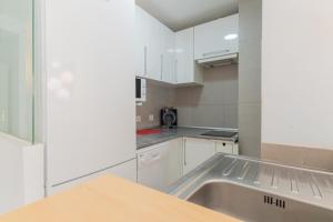 Kuchyňa alebo kuchynka v ubytovaní Apartamentos Castillo
