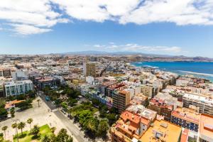 an aerial view of a city and the ocean at Apartment Santa Catalina in Las Palmas de Gran Canaria