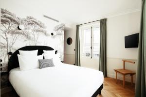 Ένα ή περισσότερα κρεβάτια σε δωμάτιο στο My Maison In Paris - Champ de Mars