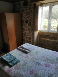 Giường trong phòng chung tại The Maggie Farm