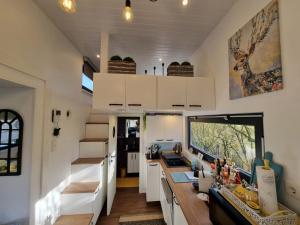 Postel nebo postele na pokoji v ubytování Sunset Tiny House GbR