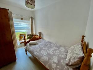 Cama o camas de una habitación en Ty-Nance Cottage