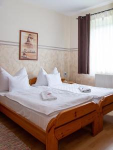 Postel nebo postele na pokoji v ubytování Hotel Zéta