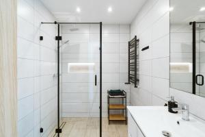 Kúpeľňa v ubytovaní Apartament Na Borach I SPA