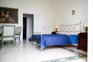 Postel nebo postele na pokoji v ubytování Villacore Capri