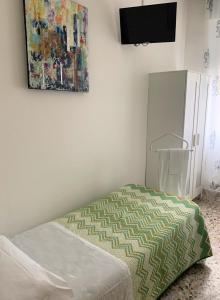 Letto o letti in una camera di Albergo Moderno