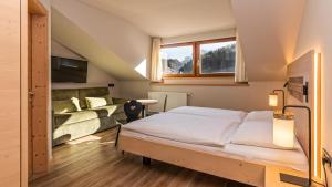 Postel nebo postele na pokoji v ubytování Garni Pramstrahler + 37 fotografií