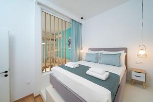Posteľ alebo postele v izbe v ubytovaní Hibiscus Villa
