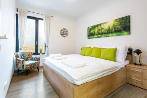 Postel nebo postele na pokoji v ubytování SCANDIC Apartments Plešivec