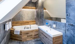 Vannituba majutusasutuses SCANDIC Apartments Plešivec