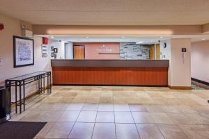The lobby or reception area at AmericInn by Wyndham Omaha