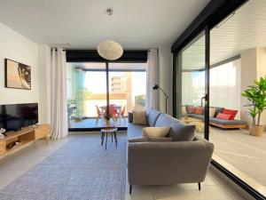 Гостиная зона в Calpe Beach II - sea & pool view apartment