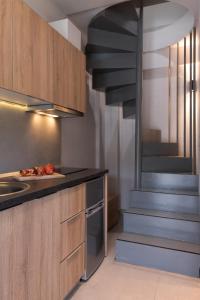Dapur atau dapur kecil di Afros Suites