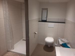 Kylpyhuone majoituspaikassa Ferienhaus Schmalkalden