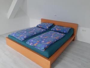Кровать или кровати в номере Ferienhaus Schmalkalden