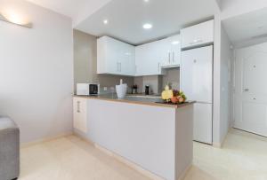 Kuchyňa alebo kuchynka v ubytovaní Apartamentos Castillo