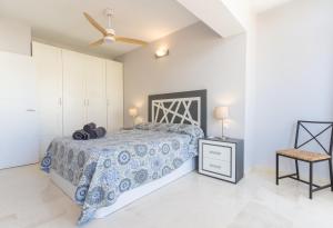 Posteľ alebo postele v izbe v ubytovaní Apartamentos Castillo