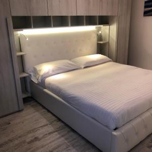 A bed or beds in a room at La Casa di Gio Golf Tennis e parcheggio privato