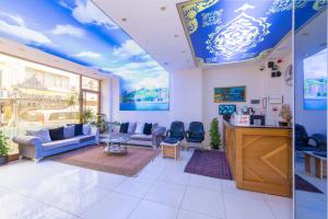 Posezení v ubytování Raimond Hotel