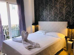 Posteľ alebo postele v izbe v ubytovaní COZY STUDIO MALAGA CENTRO by AlohaMalaga