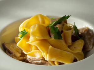 Fotografie z fotogalerie ubytování Al Fogolâr Rooms & Osteria with Saunaland v destinaci Tolmezzo