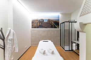 Cama ou camas em um quarto em Flag Design Hotel