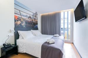 Cama ou camas em um quarto em Flag Design Hotel