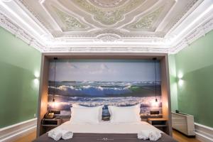 Cama ou camas em um quarto em Flag Design Hotel