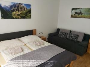 Кровать или кровати в номере Apartmán Bystrina