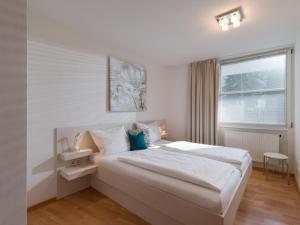 A bed or beds in a room at Kaiserhoam