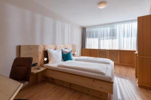 A bed or beds in a room at Kaiserhoam
