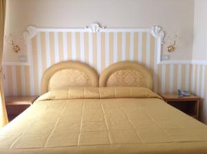 Postel nebo postele na pokoji v ubytování Hotel Sant'Agata