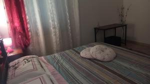 Posteľ alebo postele v izbe v ubytovaní Casa al Mare Fontespina