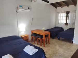 En eller flere senge i et værelse på Finca La Julia