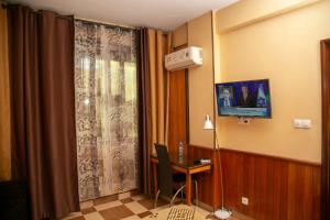 TV a/nebo společenská místnost v ubytování Yaahot