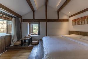 Fotografie z fotogalerie ubytování Inn in the field v destinaci Jianchuan