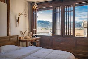 Fotografie z fotogalerie ubytování Inn in the field v destinaci Jianchuan