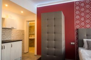 Rúm í herbergi á Villa Kiwi