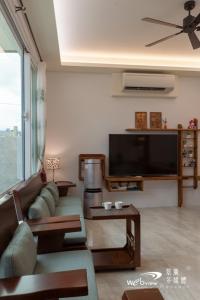 Μια τηλεόραση ή/και κέντρο ψυχαγωγίας στο SunShine B&B