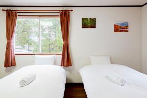 Postel nebo postele na pokoji v ubytování Chalet Strickland + 14 fotografií