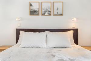 Ένα ή περισσότερα κρεβάτια σε δωμάτιο στο Coolum Beachside Apartment