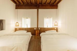 Fotografie z fotogalerie ubytování Inn in the field v destinaci Jianchuan