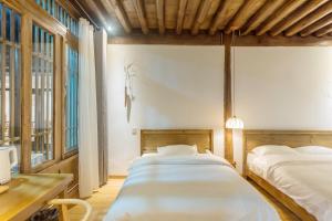 Fotografie z fotogalerie ubytování Inn in the field v destinaci Jianchuan