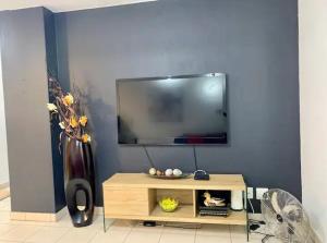 A television and/or entertainment centre at Lillys Quarter 1 - Newly Renovated!