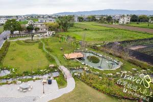 an aerial view of a park in a city at Secret Garden Homestay in Ji'an
