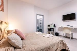Posteľ alebo postele v izbe v ubytovaní Vincanto Rooms Old Town