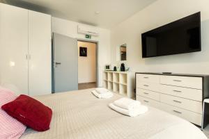 Posteľ alebo postele v izbe v ubytovaní Vincanto Rooms Old Town