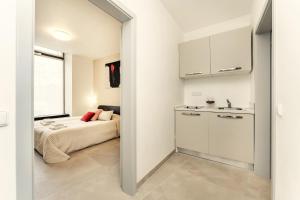 Posteľ alebo postele v izbe v ubytovaní Vincanto Rooms Old Town