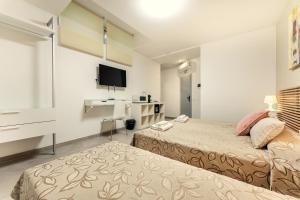 Posteľ alebo postele v izbe v ubytovaní Vincanto Rooms Old Town